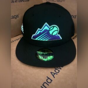 COLORADO ROCKIES 25TH ANNIVERSARY GLOW IN THE DARK NEW ERA BLACK